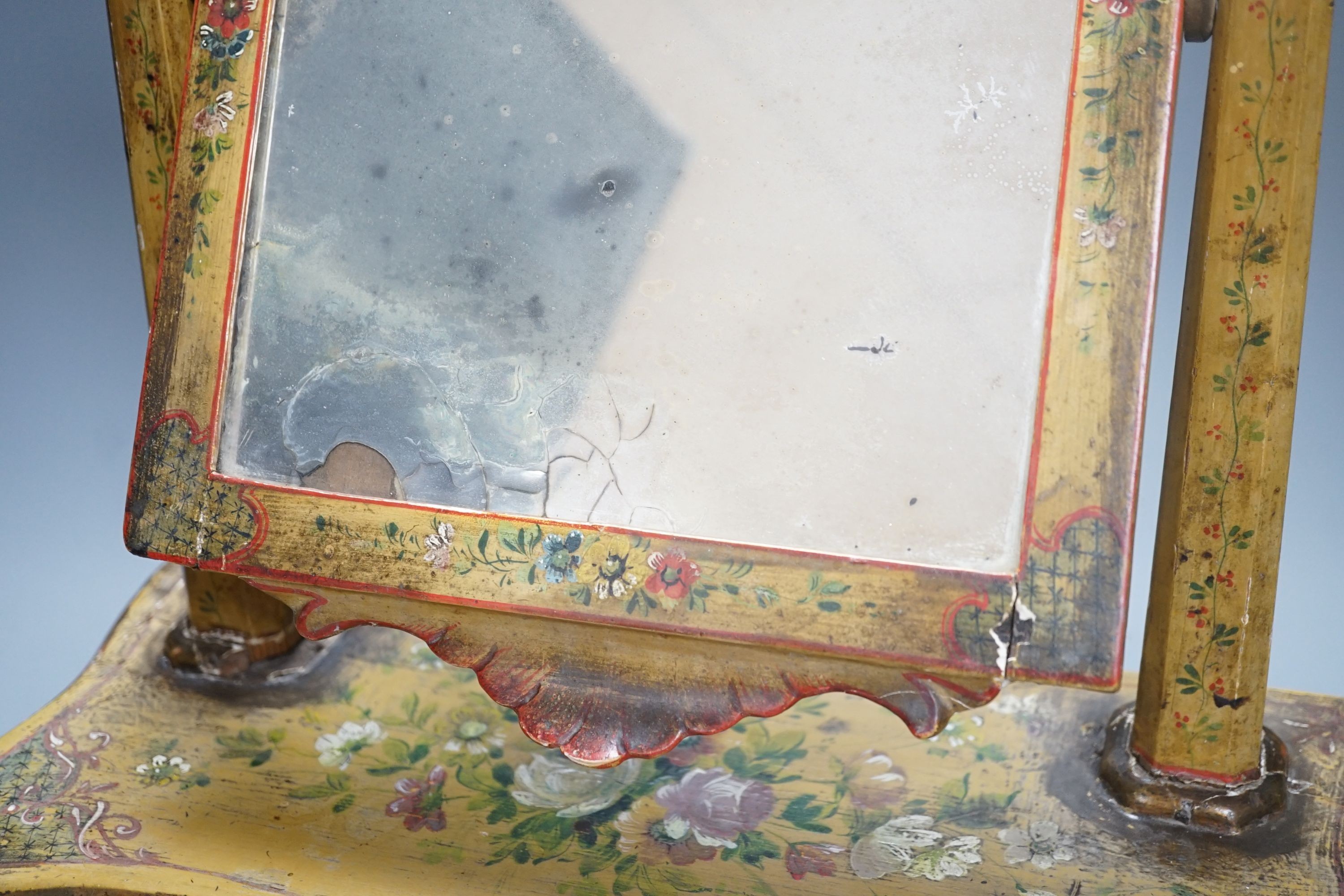 A yellow painted floral French toilet mirror - 55cm tall